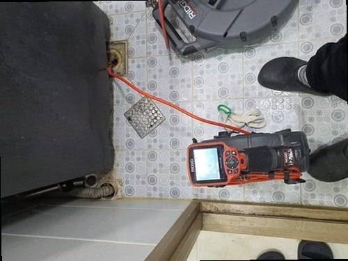 부여군 홍산면 하수구막힘 배관 점검 결과와 관리 내용을 기록하는 현장 모습